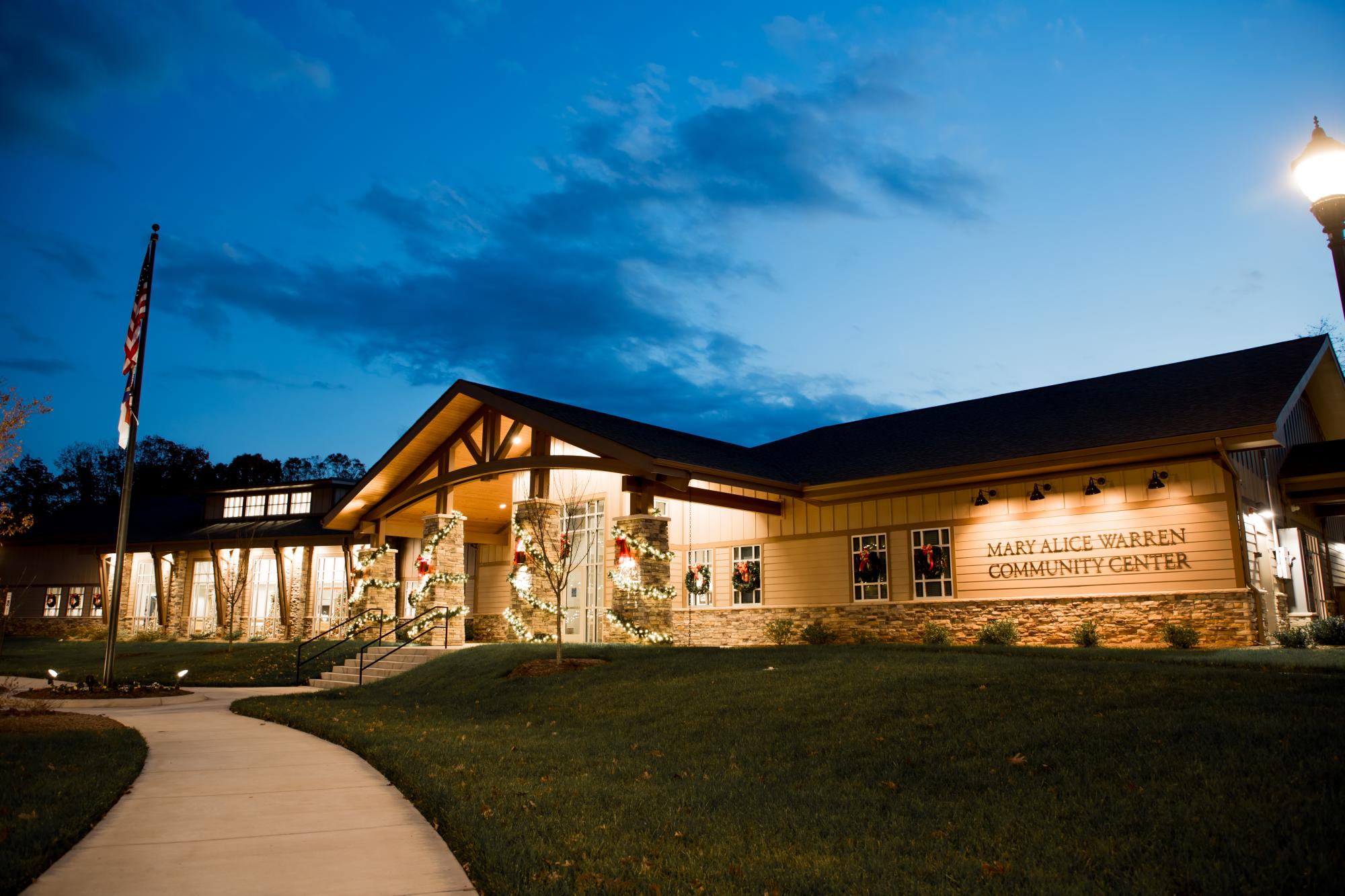 The Mary Alice Warren Community Center is decorated for the holidays, with garland and beautiful wreaths.